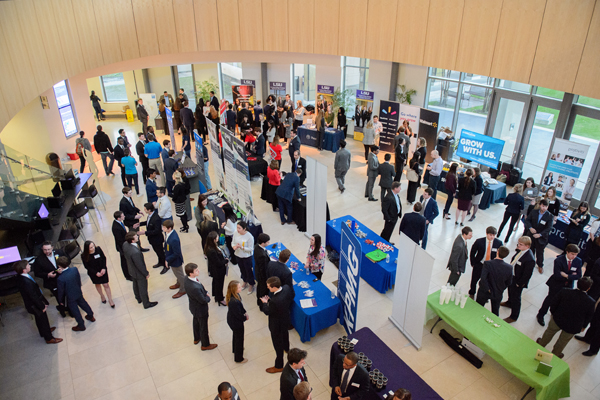 Photo of students and recruiters at an event, the image is taken from above