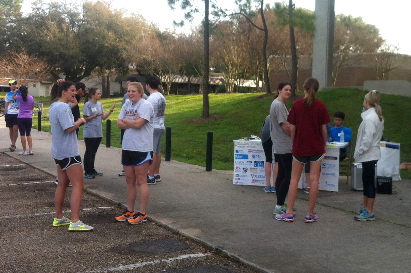 Several students standing in parking lot