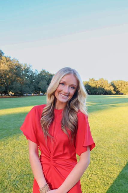 student smiling at camera
